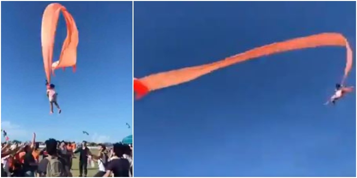 Niña arrastrada por una cometa